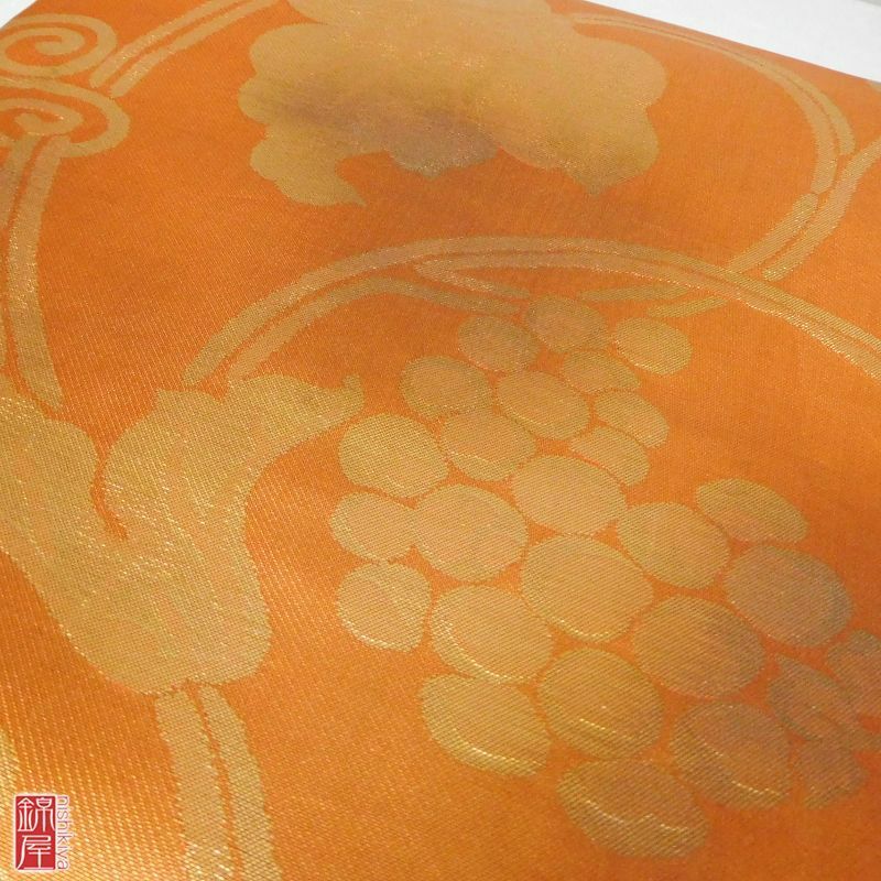 九寸名古屋帯 正絹 名古屋仕立て 六通柄 良品 橙地に木の葉・植物柄_画像2