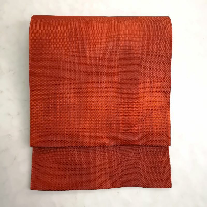 八寸名古屋帯 全通柄 松葉仕立て 正絹 橙地にチェック・格子柄