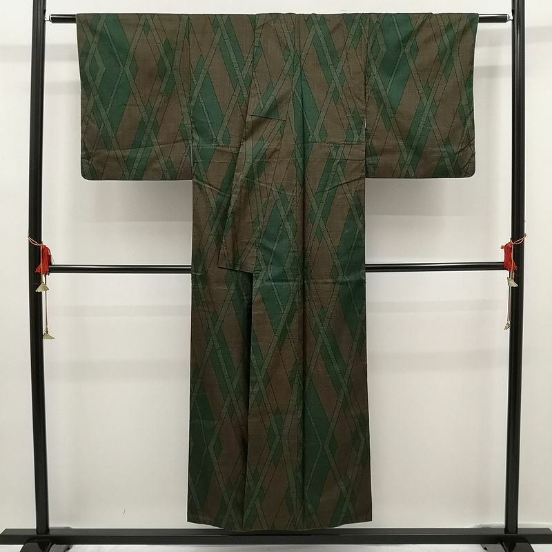 織柄紬 正絹 良品 緑・うぐいす色地に木の葉・植物柄_画像2