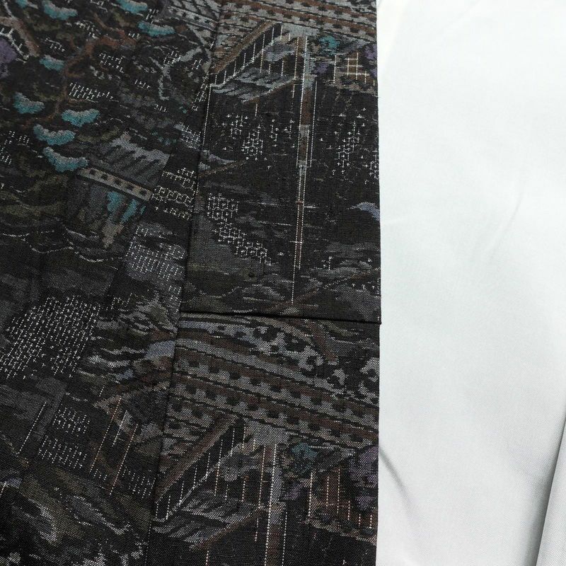 紬 良品 本真綿紬 百亀甲総絣 証紙あり しつけ糸付き 正絹 風景柄 袷仕立て 身丈157cm 裄丈65.5cm 黒_画像16