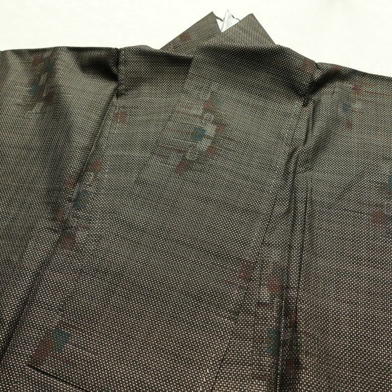 大島紬 古代染色純泥染 良品 証紙あり 正絹 幾何学柄・抽象柄 袷仕立て 身丈162cm 裄丈63cm 一部しつけ糸付き 着物 茶_画像16