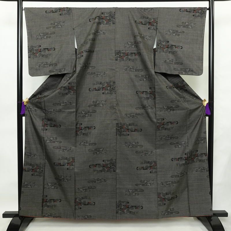 大島紬 良品 創匠きゅうの 古代染色純泥染 証紙あり 正絹 木の葉・植物柄 袷仕立て 身丈162.5cm 裄丈67cm 本場大島紬 伝統工芸 一部しつけ糸付き 着物 茶_画像1