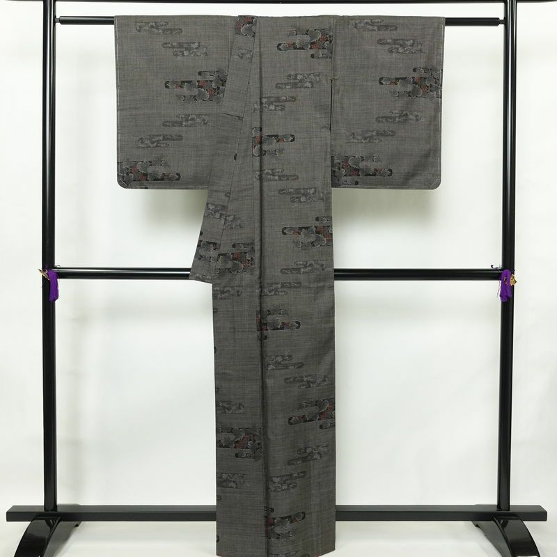 大島紬 良品 創匠きゅうの 古代染色純泥染 証紙あり 正絹 木の葉・植物柄 袷仕立て 身丈162.5cm 裄丈67cm 本場大島紬 伝統工芸 一部しつけ糸付き 着物 茶_画像2