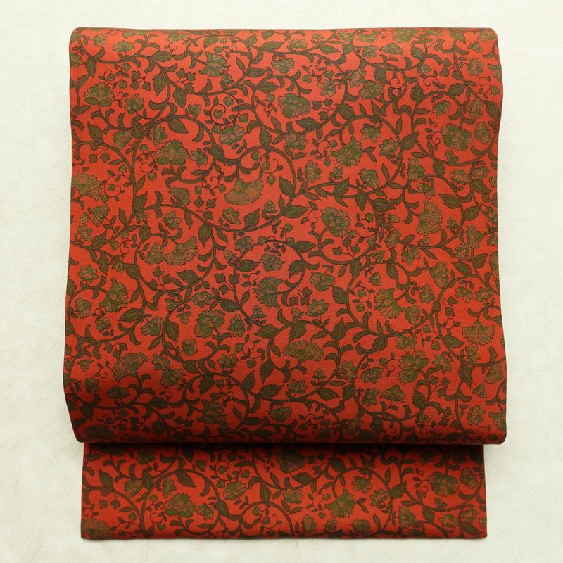 名古屋帯 全通柄 良品 正絹 木の葉・植物柄 名古屋仕立て なごや帯 リサイクル帯 帯 唐草 カジュアル 赤・朱_画像1