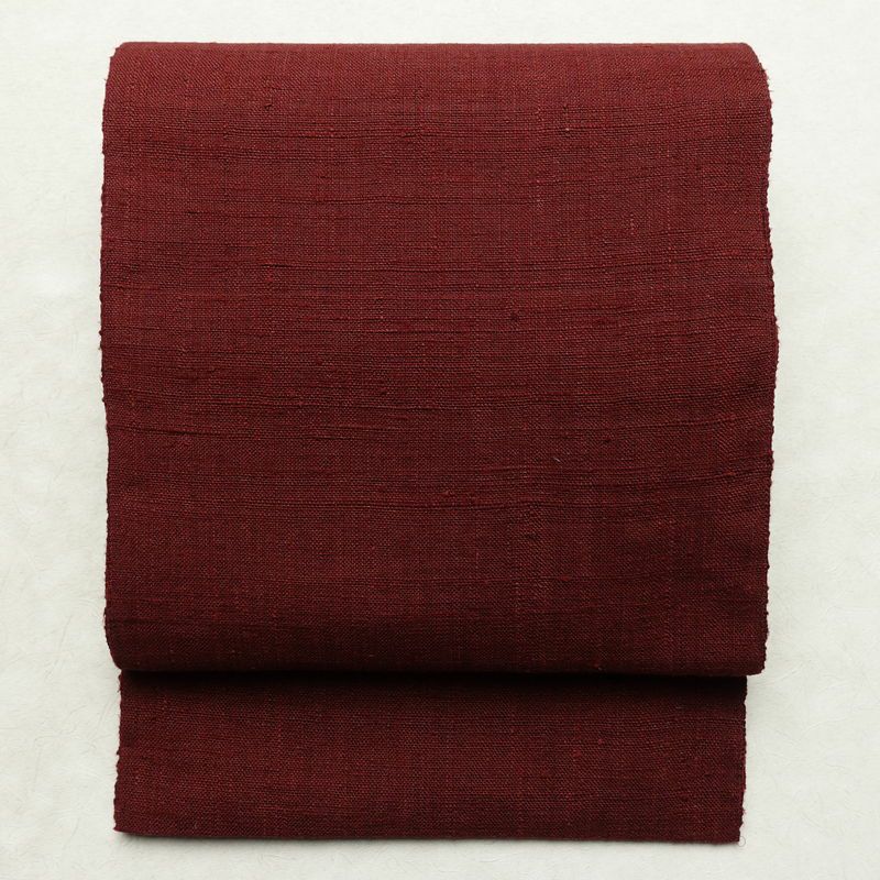 名古屋帯 全通柄 良品 正絹 無地 通し仕立て なごや帯 リサイクル帯 帯 紬地 小豆・エンジ_画像1