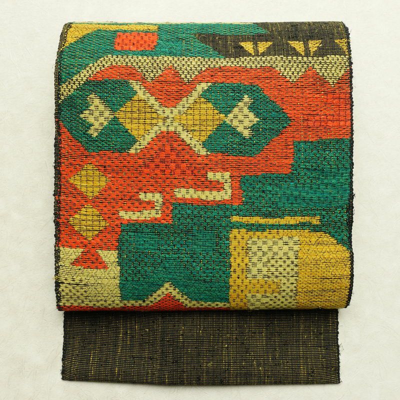 名古屋帯 太鼓柄 美品 正絹 幾何学柄・抽象柄 松葉仕立て なごや帯 リサイクル帯 帯 紬地 黒_画像1